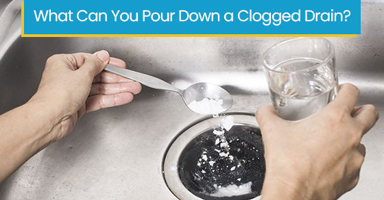 What can you pour down a clogged drain?